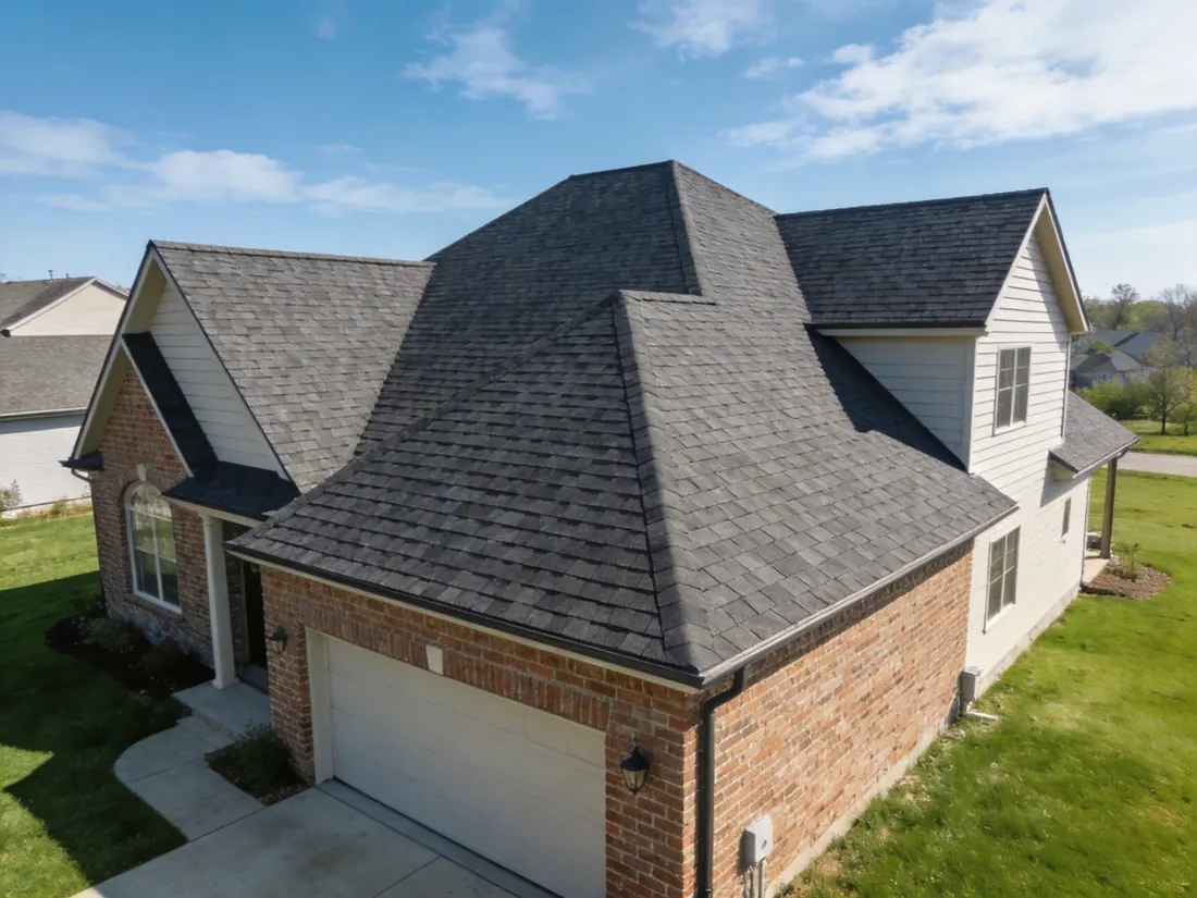 Newly completed charcoal architectural shingle roof on a two-story home in the Lawton, OK area